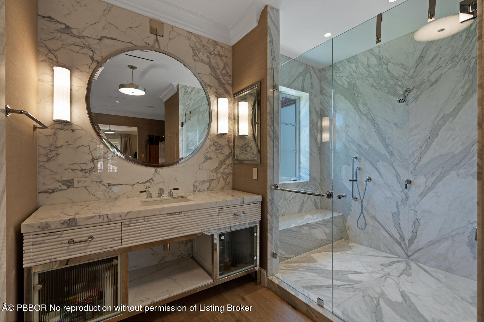 111 Via Del Lago Palm Beach, FL 33480 - Photo 46 of 72 a bathroom with a sink a mirror and vanity