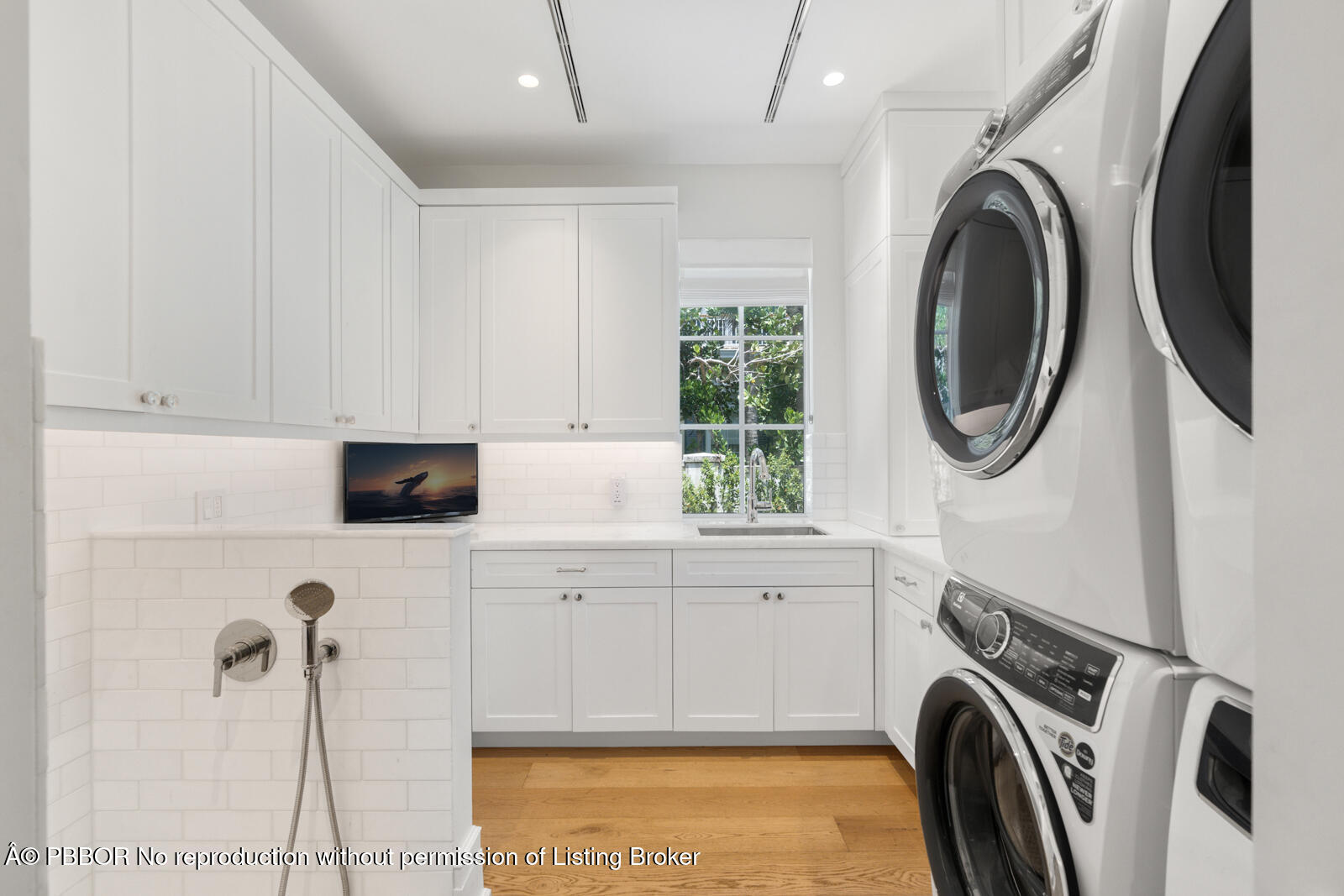 111 Via Del Lago Palm Beach, FL 33480 - Photo 47 of 72 a view of a storage & utility room with a washer dryer