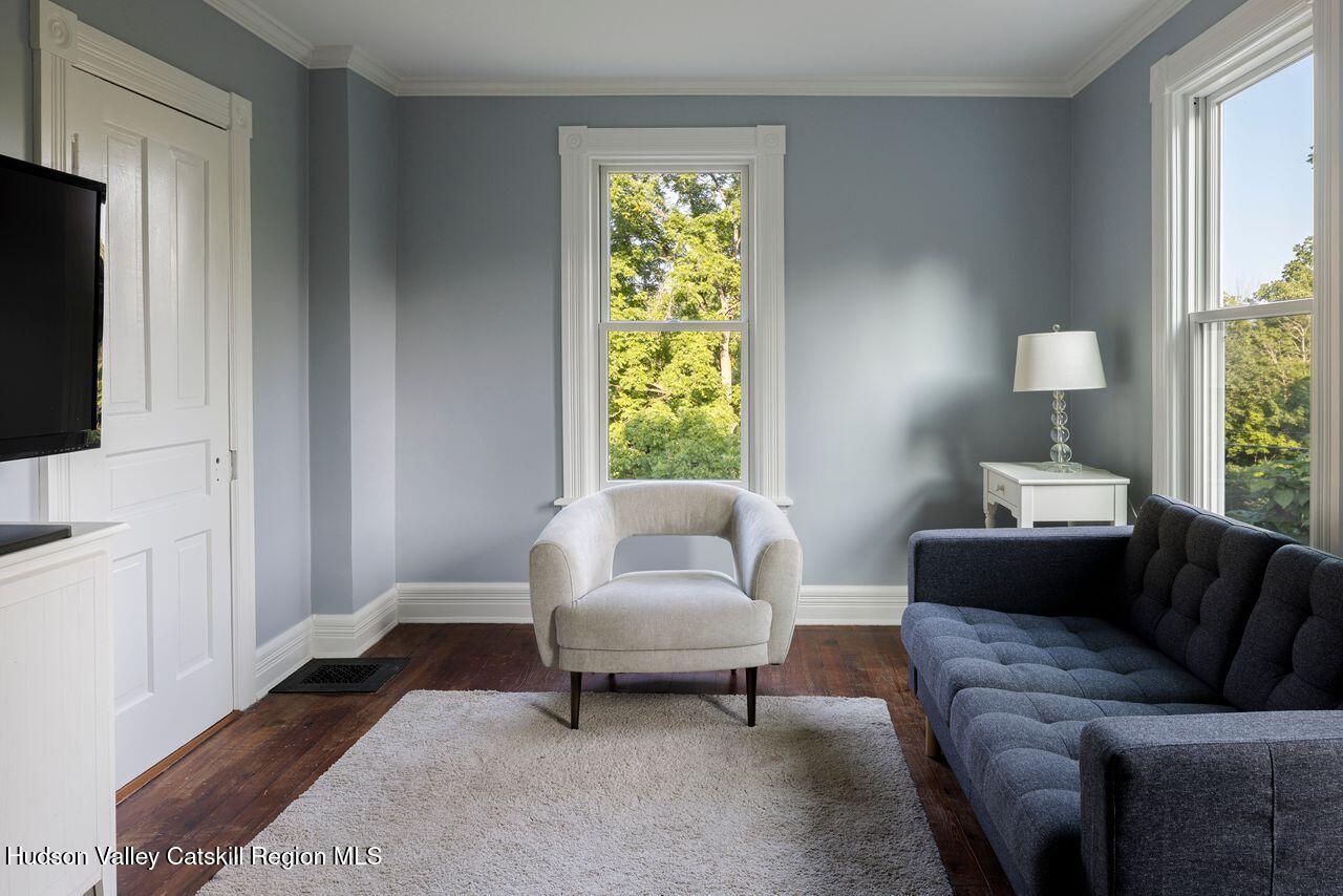 276 Leeds Athens Road Athens, NY 12015 - Photo 16 of 27 a living room with furniture and a flat screen tv