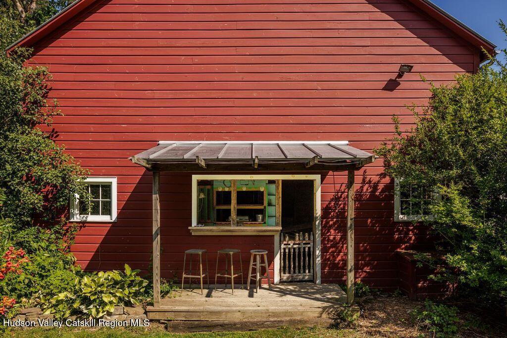 276 Leeds Athens Road Athens, NY 12015 - Photo 25 of 27 a front view of a house with garden