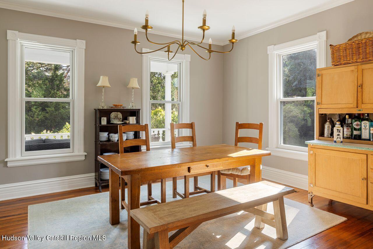 276 Leeds Athens Road Athens, NY 12015 - Photo 10 of 27 a dining room with a window table and chairs