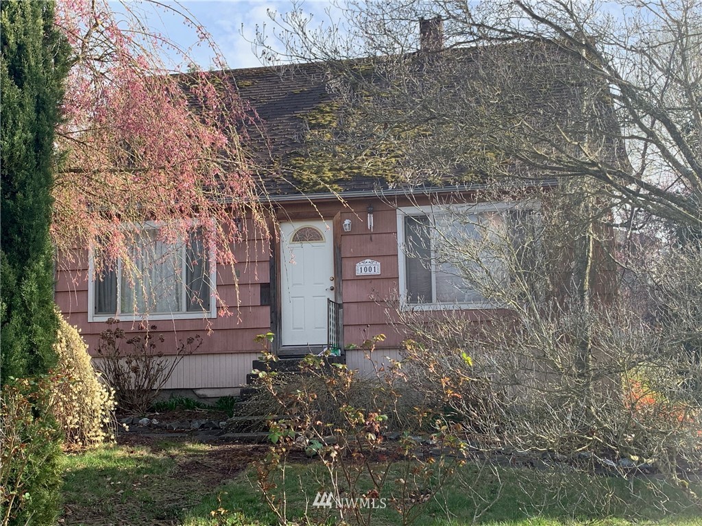 1001 North 33rd Place Renton, WA 98056 - Photo 1 of 1 a view of a house with a yard