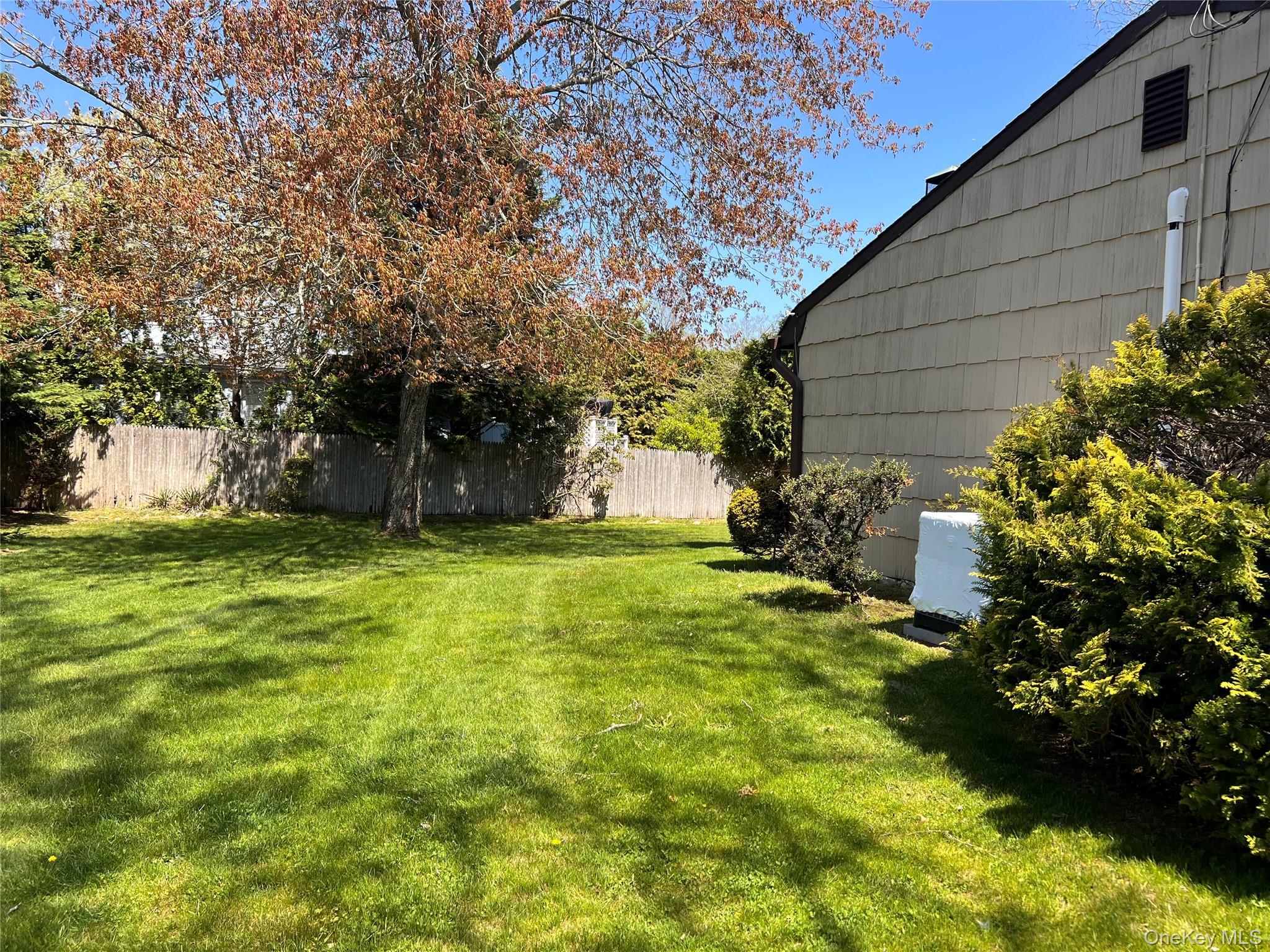 27 West Tiana Road, Unit A Hampton Bays, NY 11946 - Photo 14 of 16