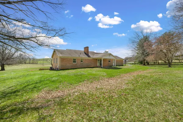 a view of a golf course with a lake