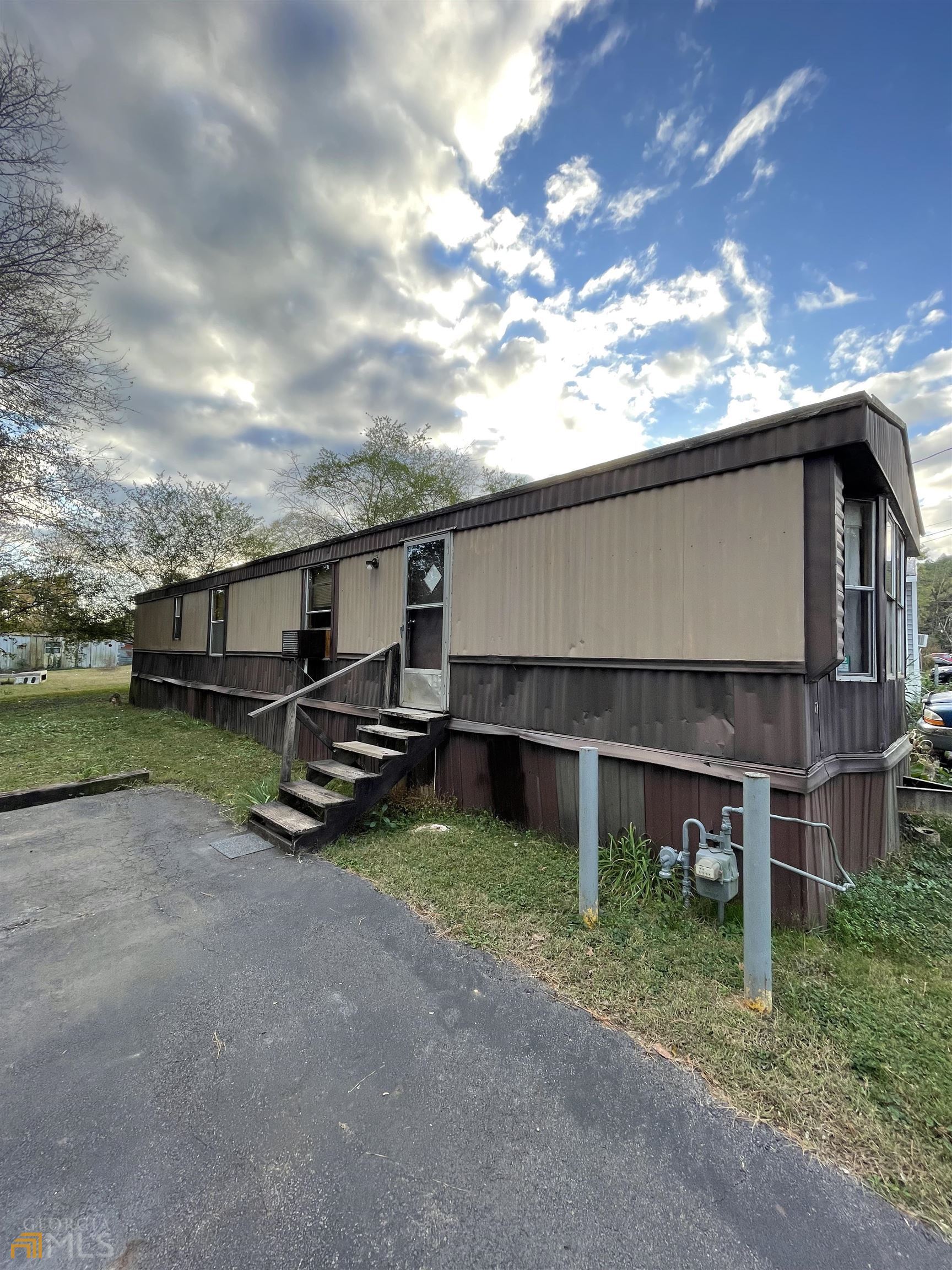 126 Mchenry Drive Southwest, Unit 37 Rome, GA 30161 - Photo 1 of 1 a view of a house with a yard