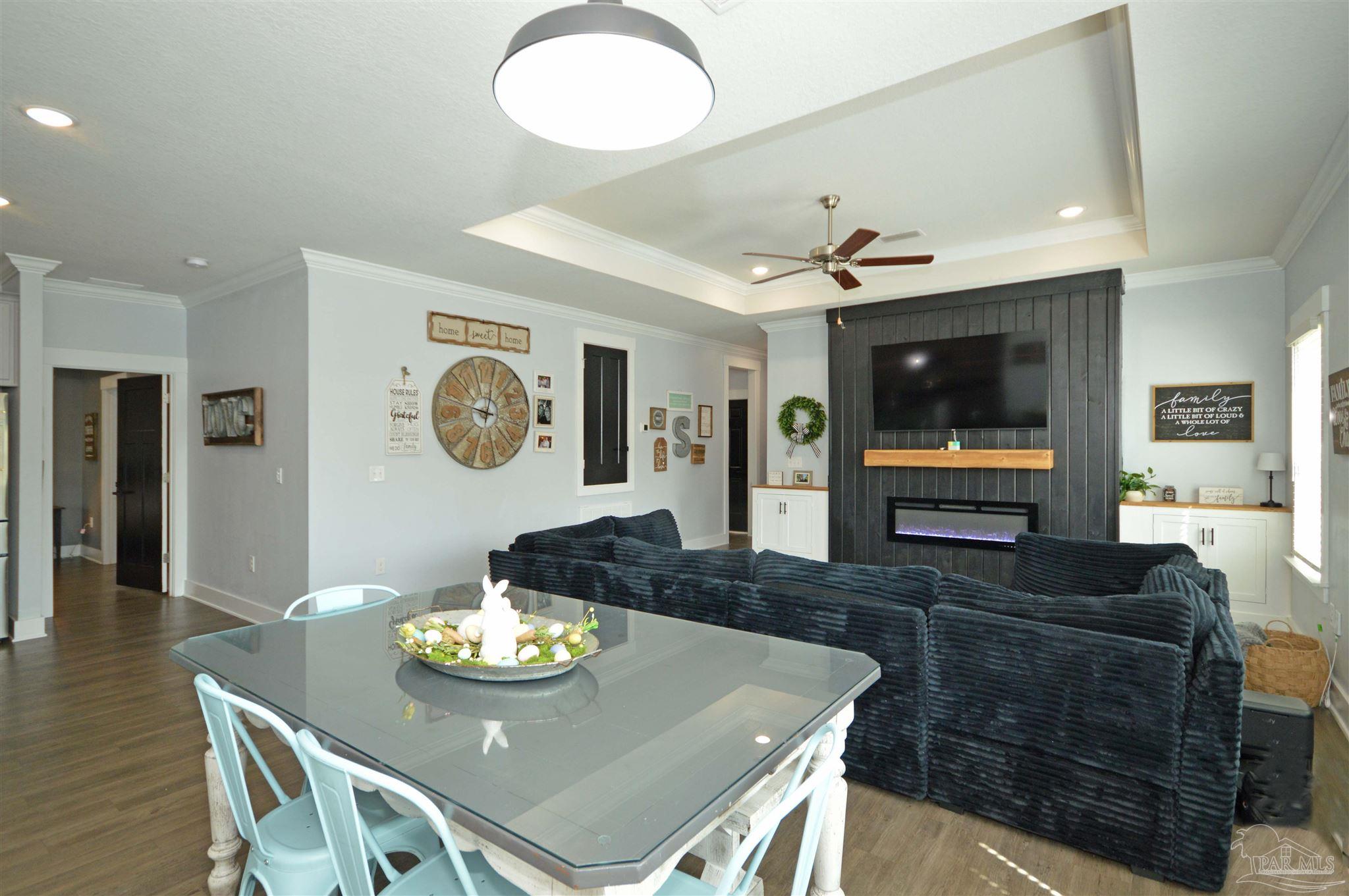 4453 Jude Way Pace, FL 32571 - Photo 15 of 41 a view of a dining room with furniture