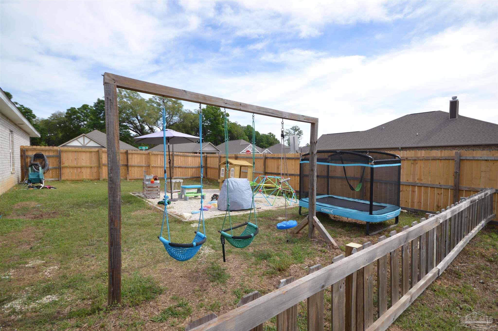 4453 Jude Way Pace, FL 32571 - Photo 39 of 41 a view of a chairs and tables in the deck yard