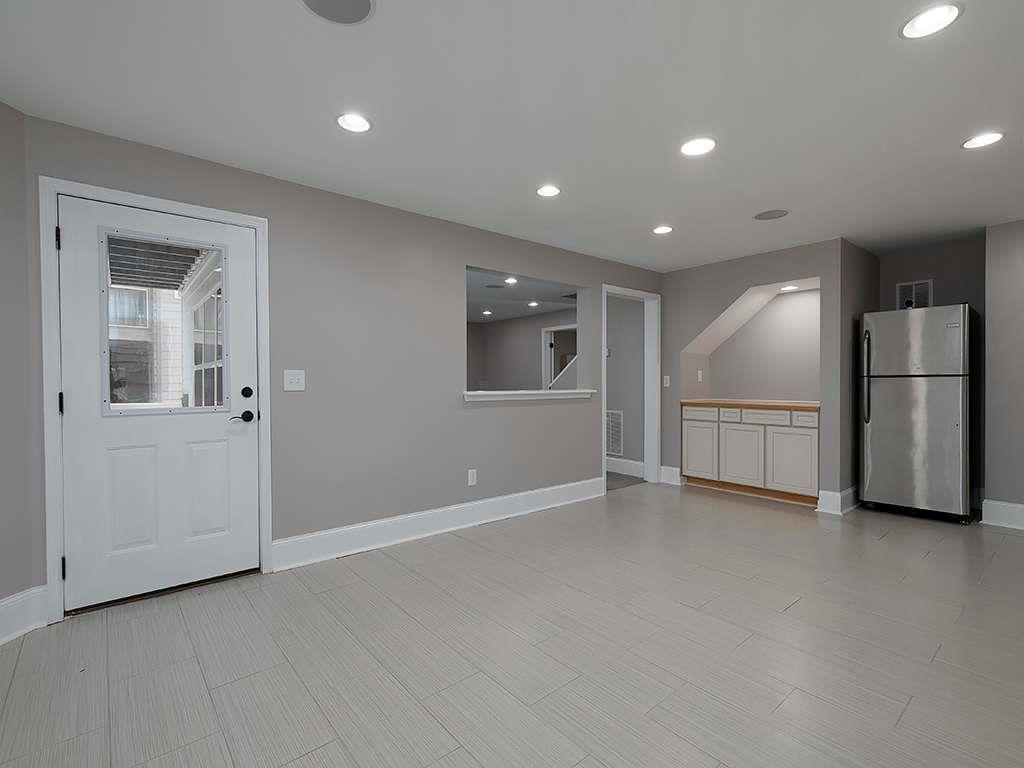 821 Tramore Road Acworth, GA 30102 - Photo 30 of 36 a view of an empty room with a kitchen