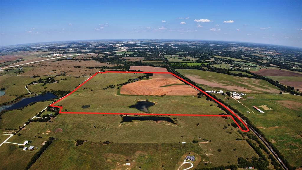 1131 Old Denton Road Gainesville, TX 76240 - Photo 7 of 9 an aerial view of a city