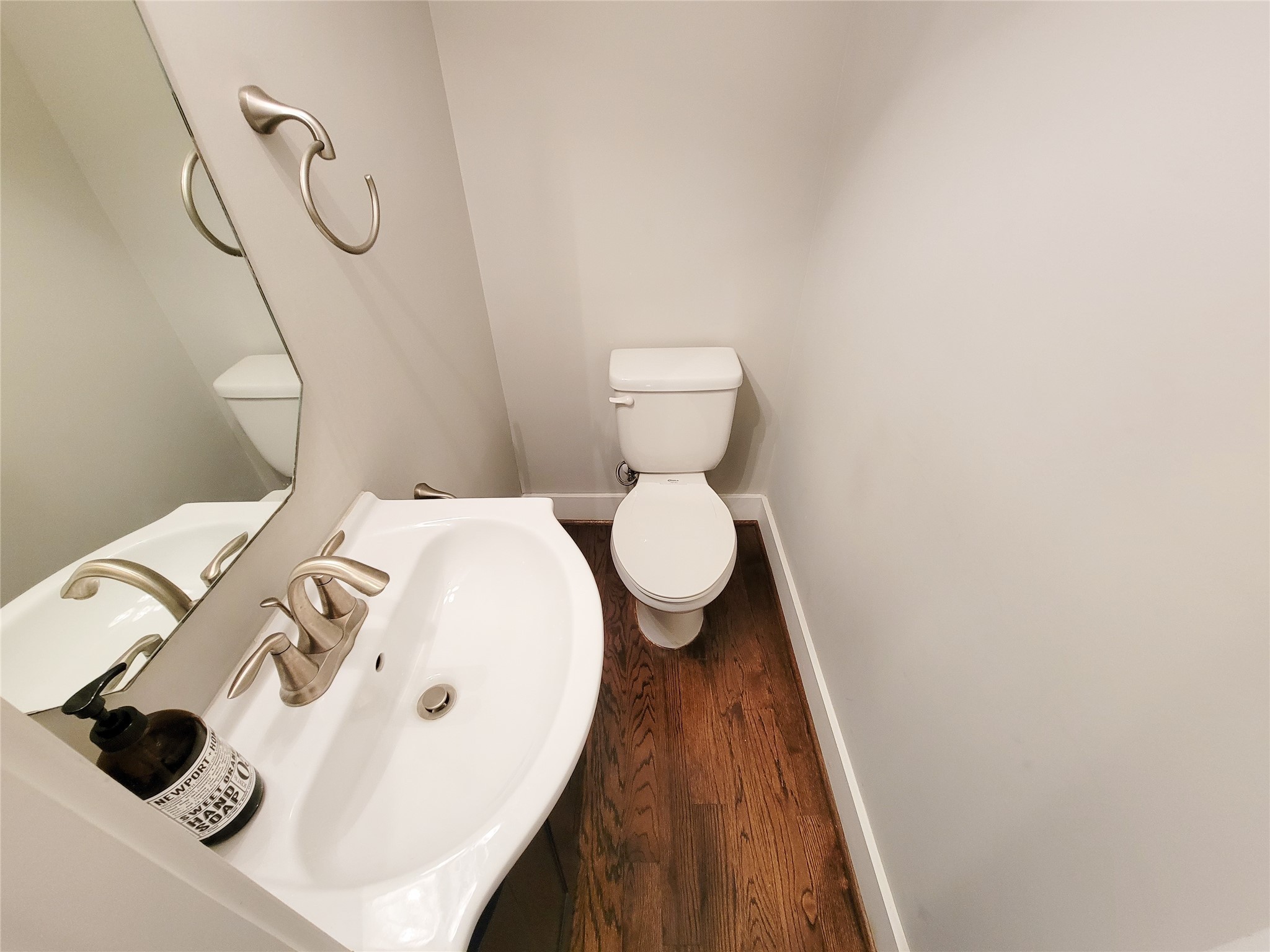 1424 Wilson Street Houston, TX 77019 - Photo 12 of 47 a bathroom with a sink and a mirror