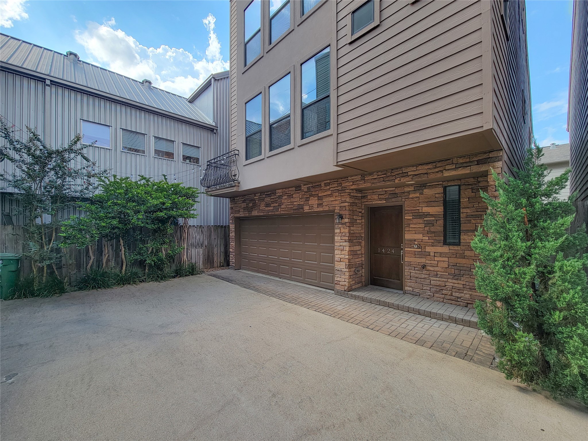 1424 Wilson Street Houston, TX 77019 - Photo 2 of 47 a front view of a house with plants