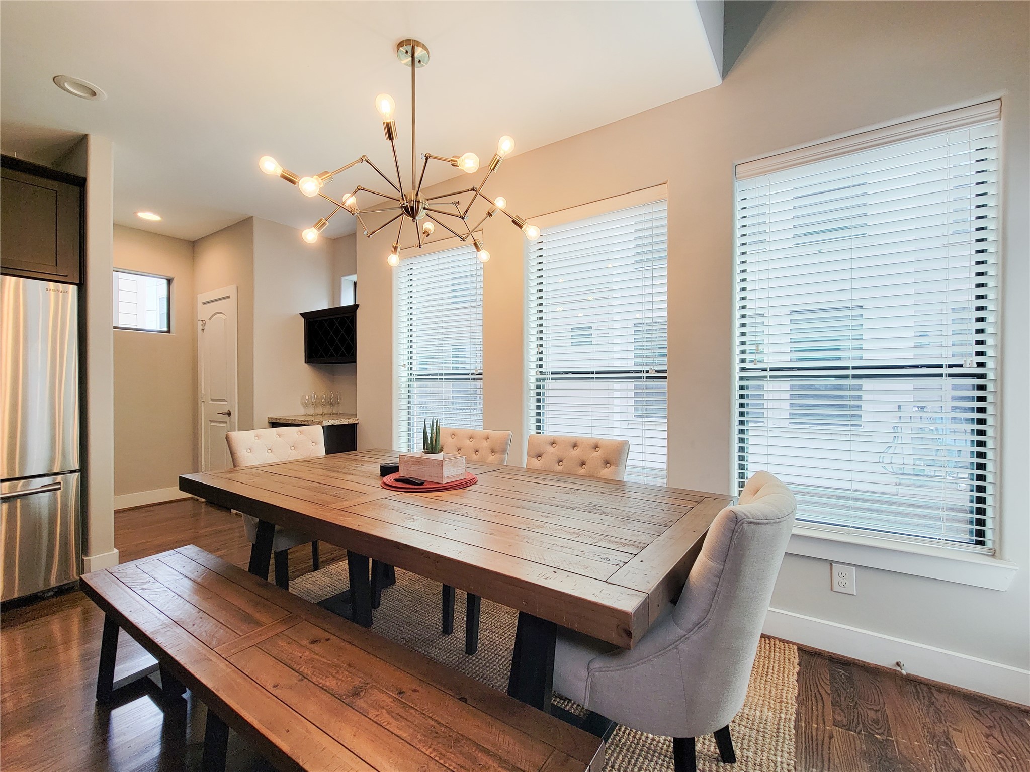 1424 Wilson Street Houston, TX 77019 - Photo 23 of 47 a view of a kitchen dining table and chairs