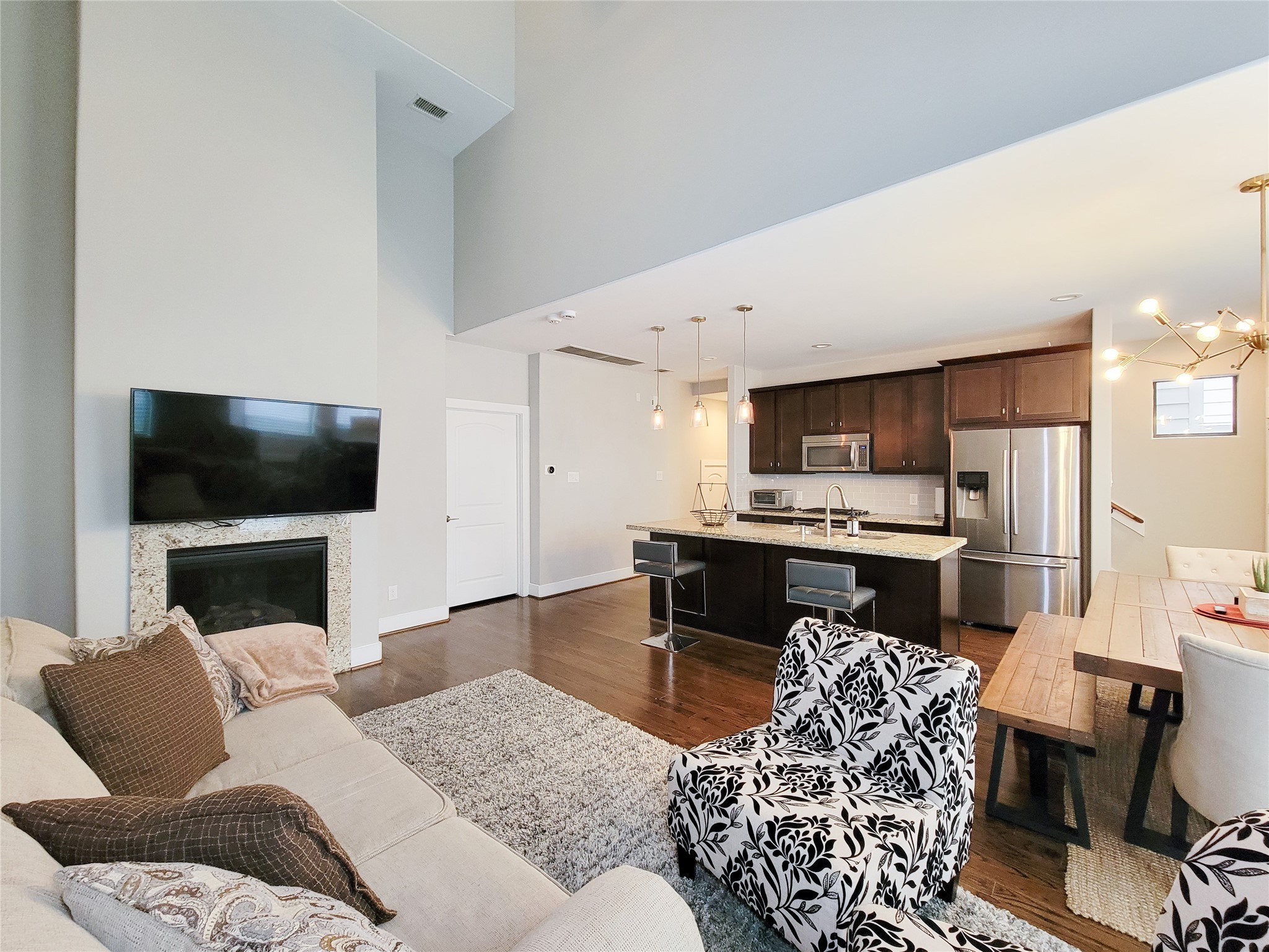 1424 Wilson Street Houston, TX 77019 - Photo 25 of 47 a living room with furniture and a flat screen tv