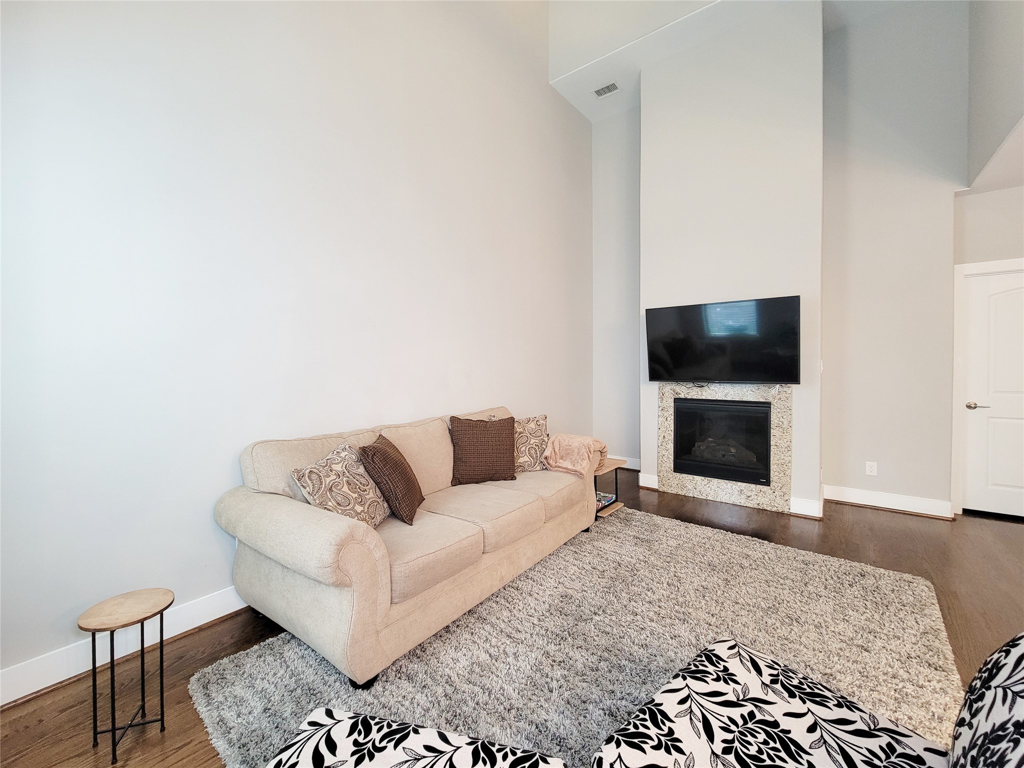 1424 Wilson Street Houston, TX 77019 - Photo 30 of 47 a living room with furniture and a flat screen tv