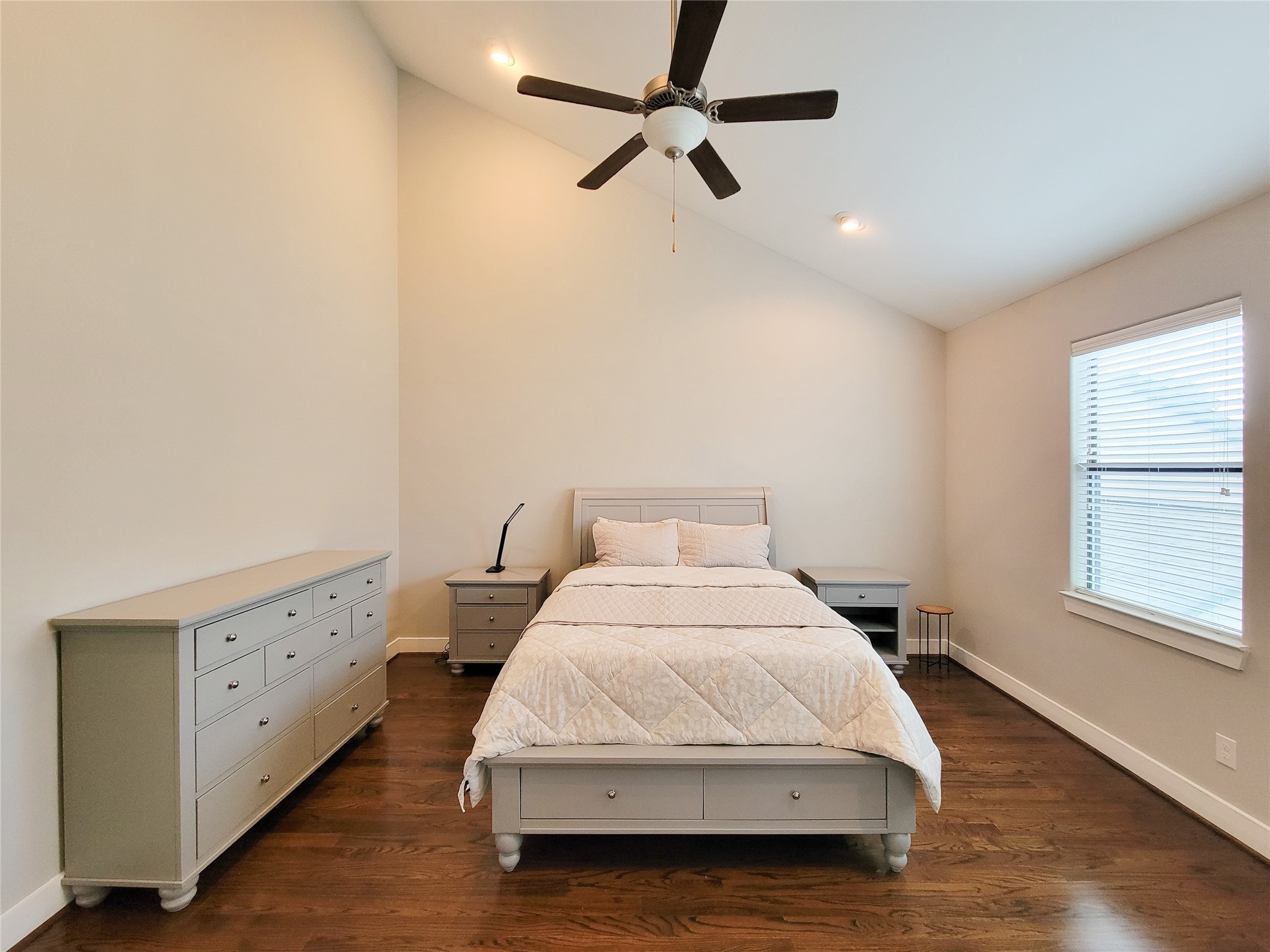 1424 Wilson Street Houston, TX 77019 - Photo 35 of 47 a bedroom with a bed and window