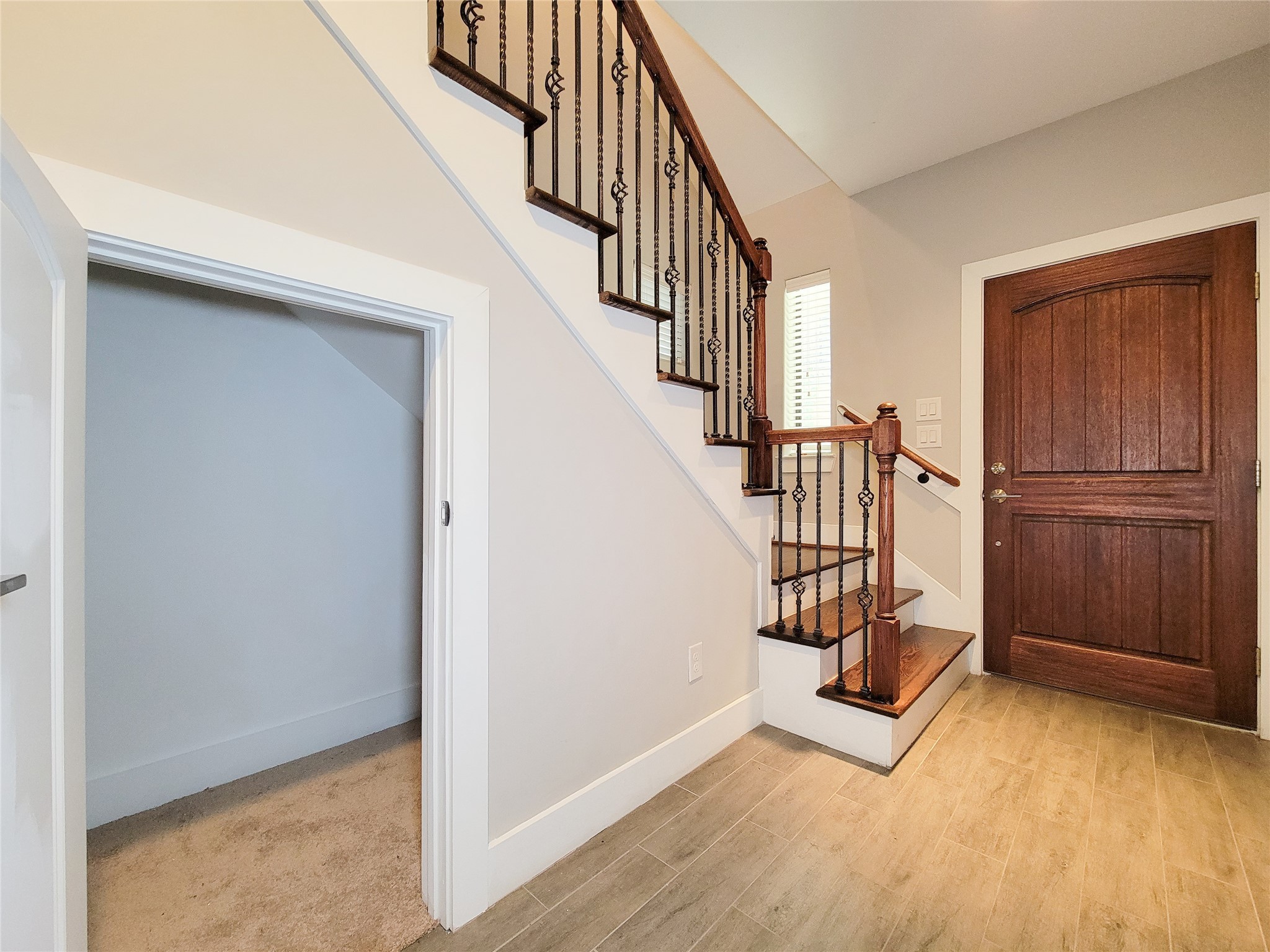 1424 Wilson Street Houston, TX 77019 - Photo 6 of 47 a view of entryway with wooden floor