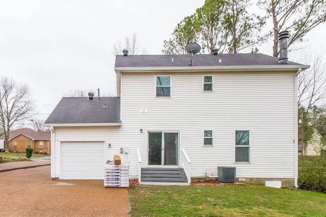 a front view of house with yard