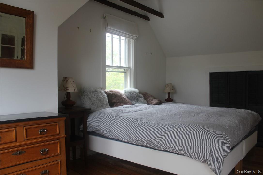 17 Gold Dan Road, Unit 56C Swan Lake, NY 12783 - Photo 14 of 33 a bedroom with a bed and a window