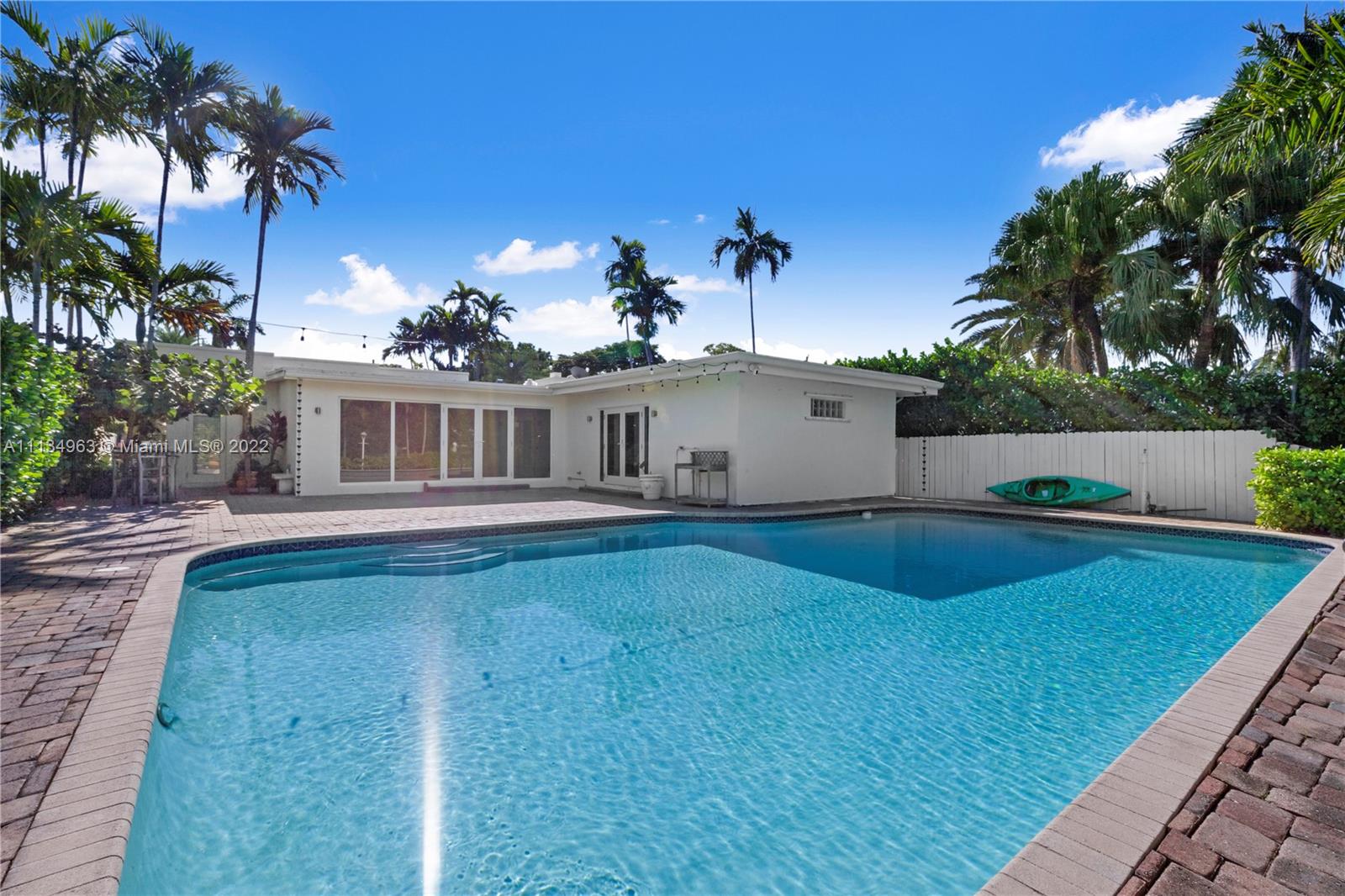 1777 Daytonia Road Miami Beach, FL 33141 - Photo 13 of 36 a view of a house with swimming pool