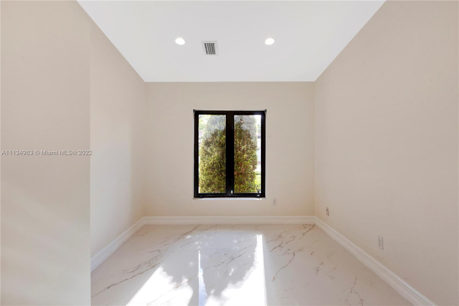 1777 Daytonia Road Miami Beach, FL 33141 - Photo 19 of 36 a view of a room that has a window in it