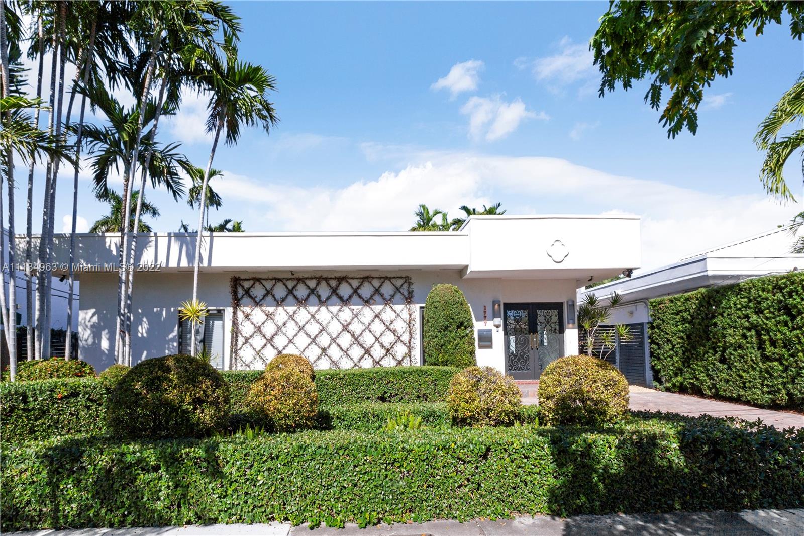 1777 Daytonia Road Miami Beach, FL 33141 - Photo 27 of 36 a view of a house with a garden