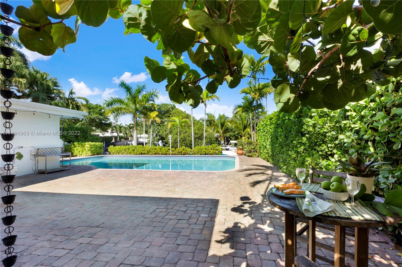 1777 Daytonia Road Miami Beach, FL 33141 - Photo 28 of 36 a view of a bench in a yard