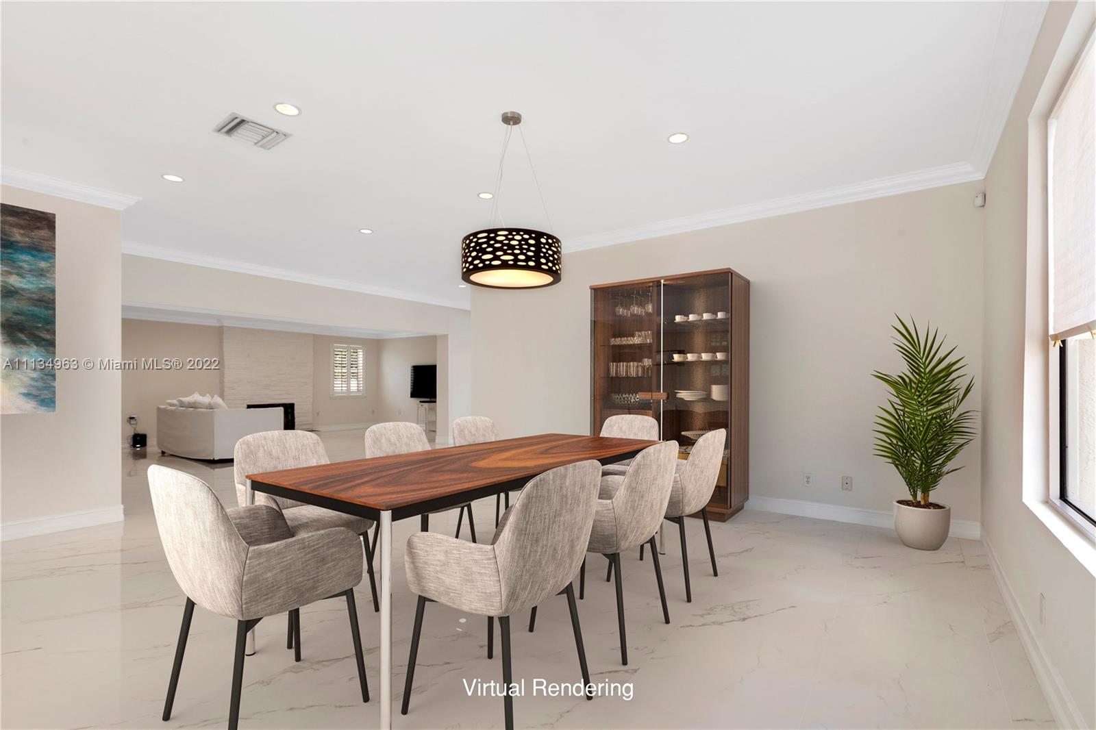 1777 Daytonia Road Miami Beach, FL 33141 - Photo 5 of 36 a view of a dining room with furniture