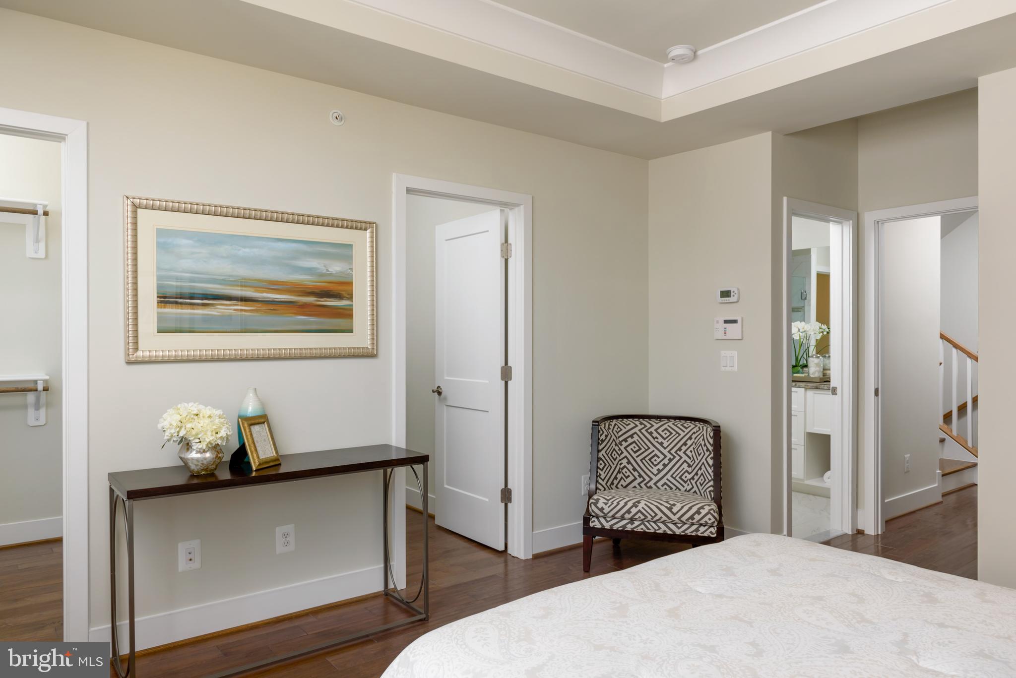 1977 Roland Clarke Place, Unit 2 Reston, VA 20191 - Photo 10 of 19 MASTER SUITE. DUAL WALK-IN CLOSETS
