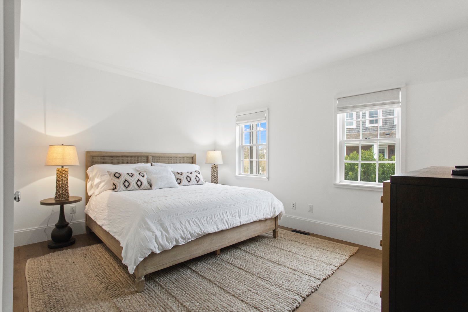 2 Blazing Star Road Nantucket, MA 02554 - Photo 9 of 47 a bedroom with a bed and a window
