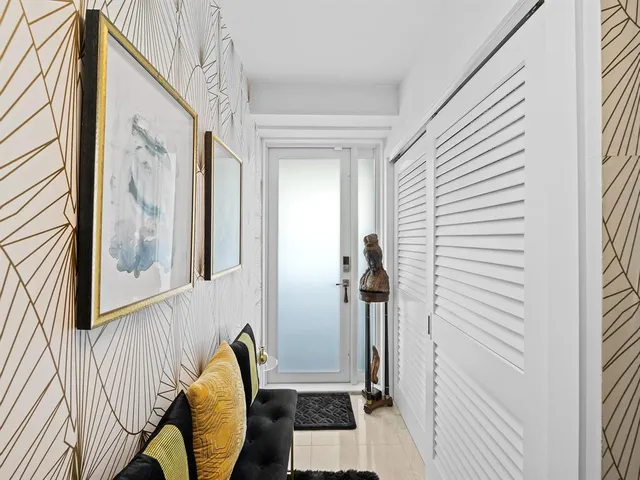 a view of balcony with furniture