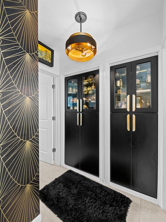 1900 South Ocean Drive, Unit 210 Fort Lauderdale, FL 33316 - Photo 17 of 31 a view of a hallway with wooden floor and door