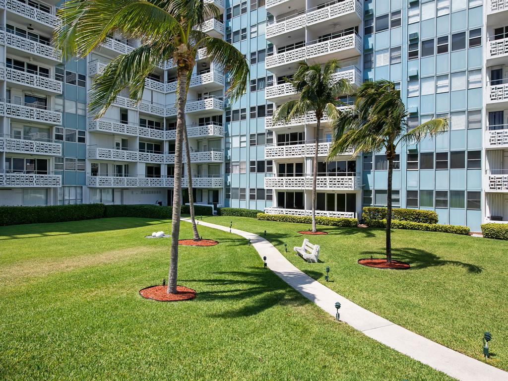 1900 South Ocean Drive, Unit 210 Fort Lauderdale, FL 33316 - Photo 4 of 31 a garden with tall buildings in the background