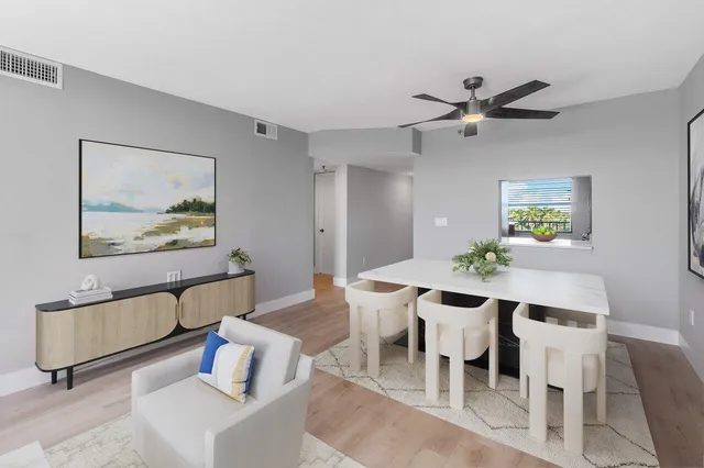 a view of a dining room with furniture