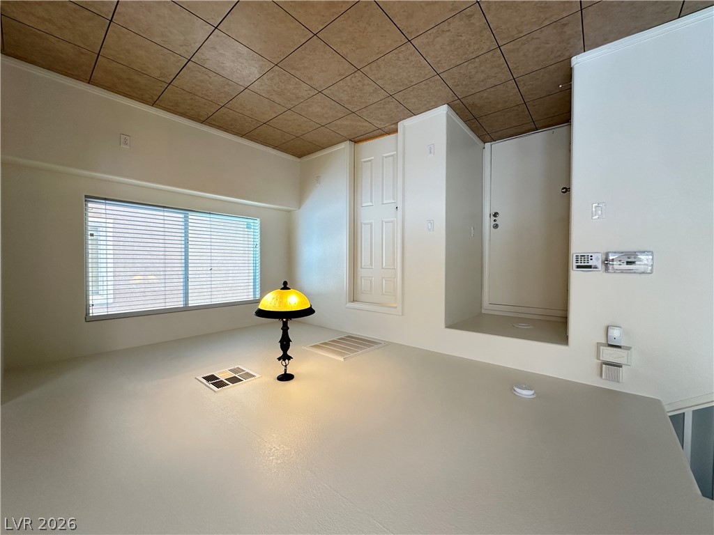 7305 Prussian Green Street Las Vegas, NV 89139 - Photo 3 of 23 A well-lit, unfinished interior space awaits your personal touch.