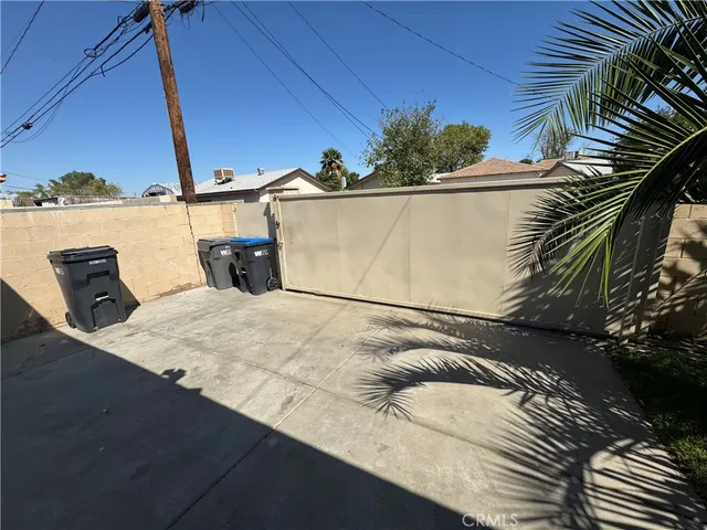 a view of a wooden floor with a potted plant