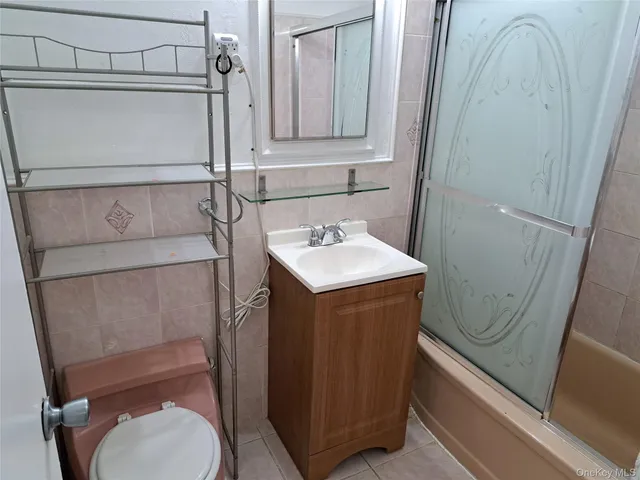 a bathroom with a sink a mirror and vanity