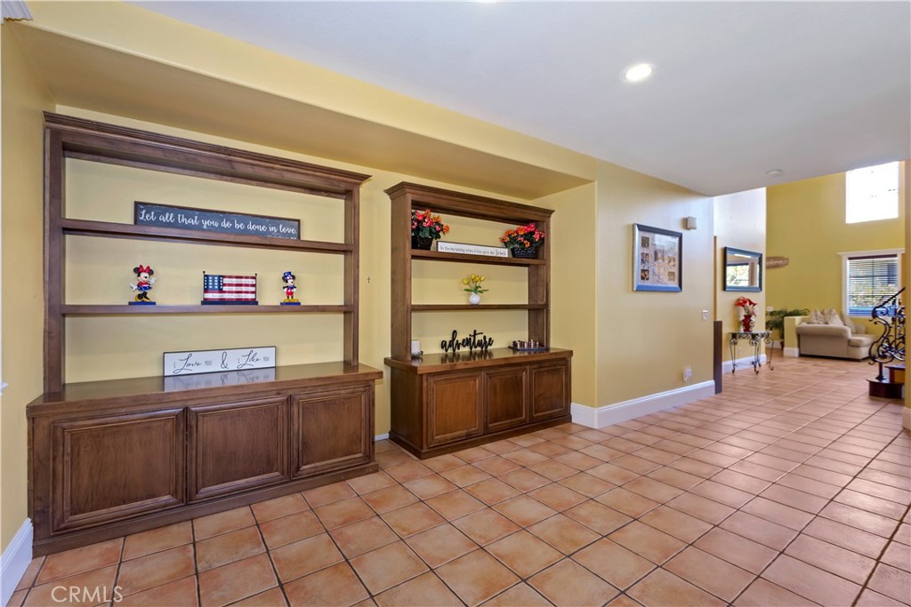 9609 Heartland Place Rancho Cucamonga, CA 91730 - Photo 22 of 48 Family Room has multiple entertainment area options.