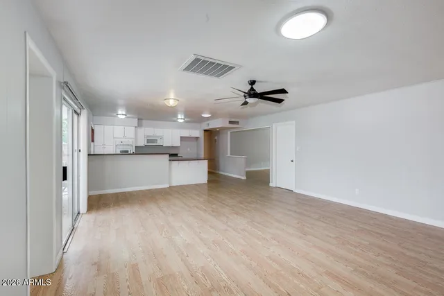 a view of kitchen with wooden floor