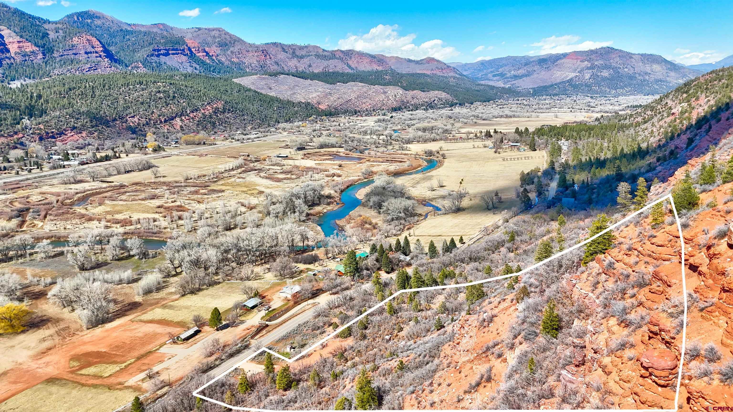 4228 County Road 250 Durango, CO 81301 - Photo 14 of 17 a view of a backyard with a mountain