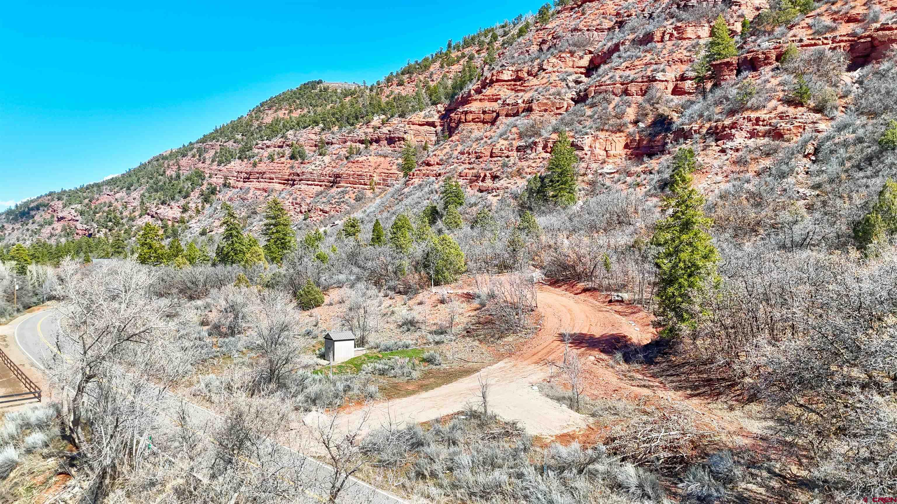 4228 County Road 250 Durango, CO 81301 - Photo 3 of 17 a view of a large building with a mountain in the background