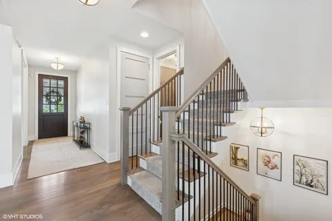 a view of entryway with wooden floor