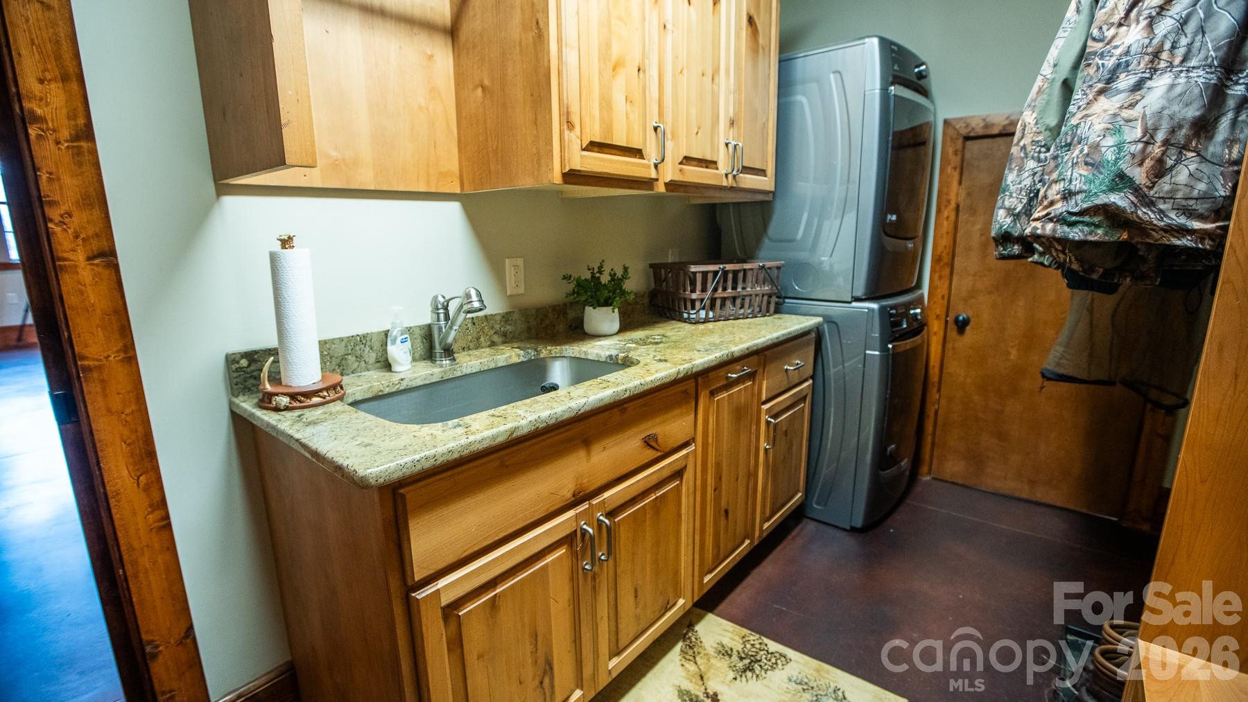 530 Upright Road Mount Ulla, NC 28125 - Photo 11 of 48 a kitchen with a sink stove and refrigerator