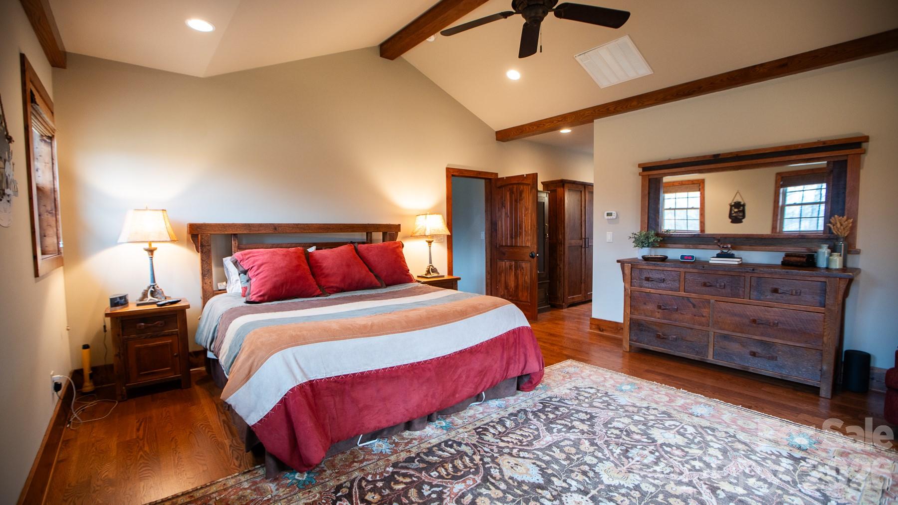 530 Upright Road Mount Ulla, NC 28125 - Photo 12 of 48 a bedroom with a bed and wooden floor