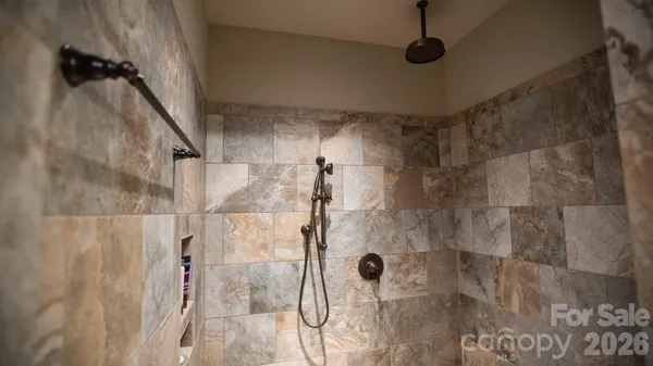 a bathroom with sink and mirror