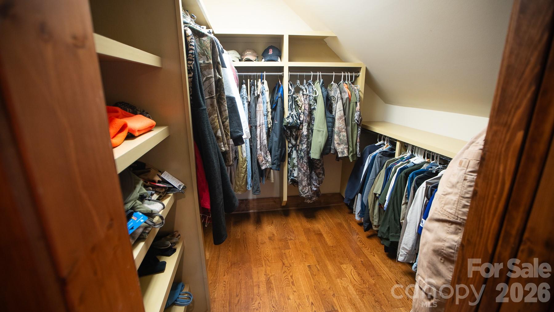 530 Upright Road Mount Ulla, NC 28125 - Photo 15 of 48 a view of walk in closet with clothes and shoes