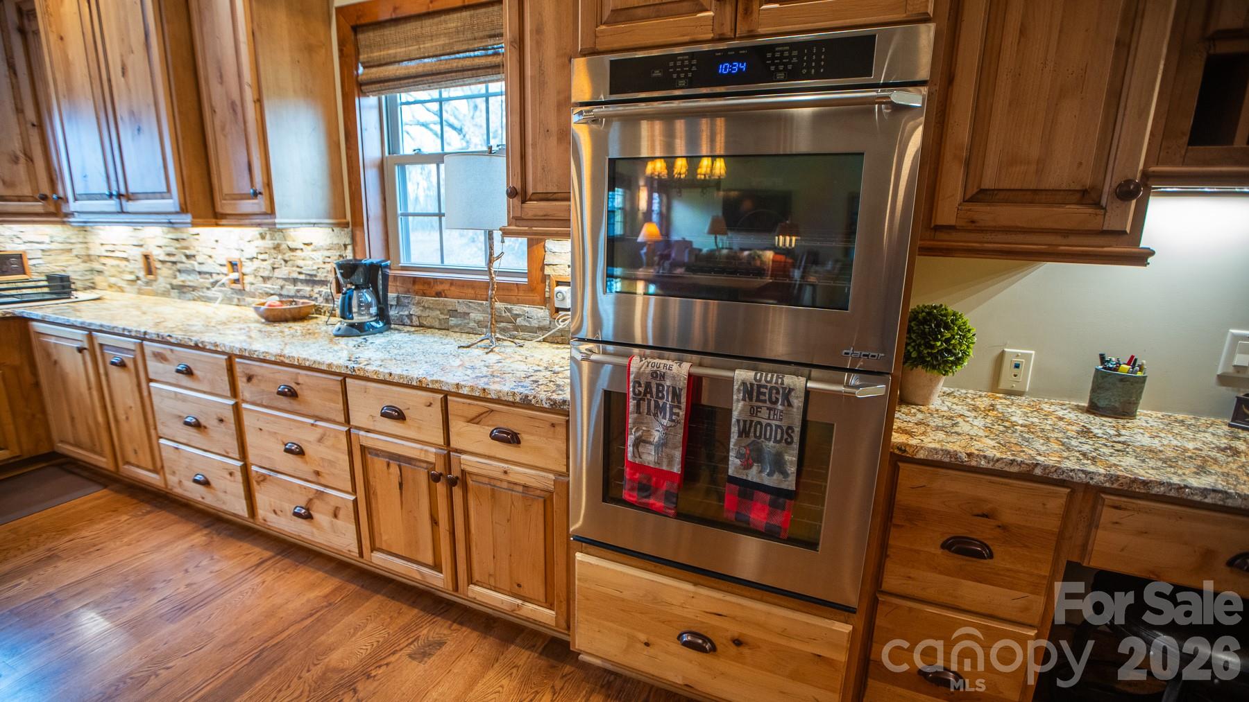 530 Upright Road Mount Ulla, NC 28125 - Photo 19 of 48 a kitchen with stainless steel appliances granite countertop a stove and a sink