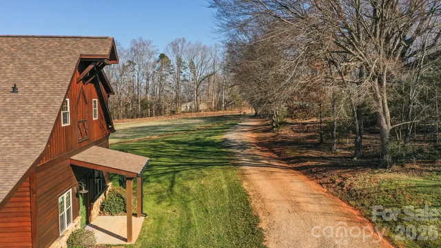 a view of a yard with trees