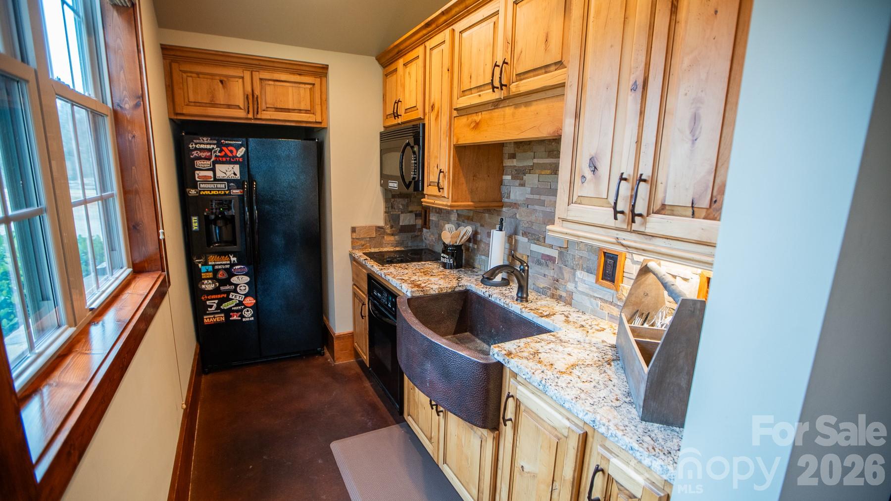 530 Upright Road Mount Ulla, NC 28125 - Photo 8 of 48 a kitchen with stainless steel appliances granite countertop a refrigerator a stove and a sink with wooden floor