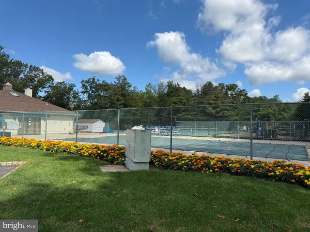a view of a house with a big yard