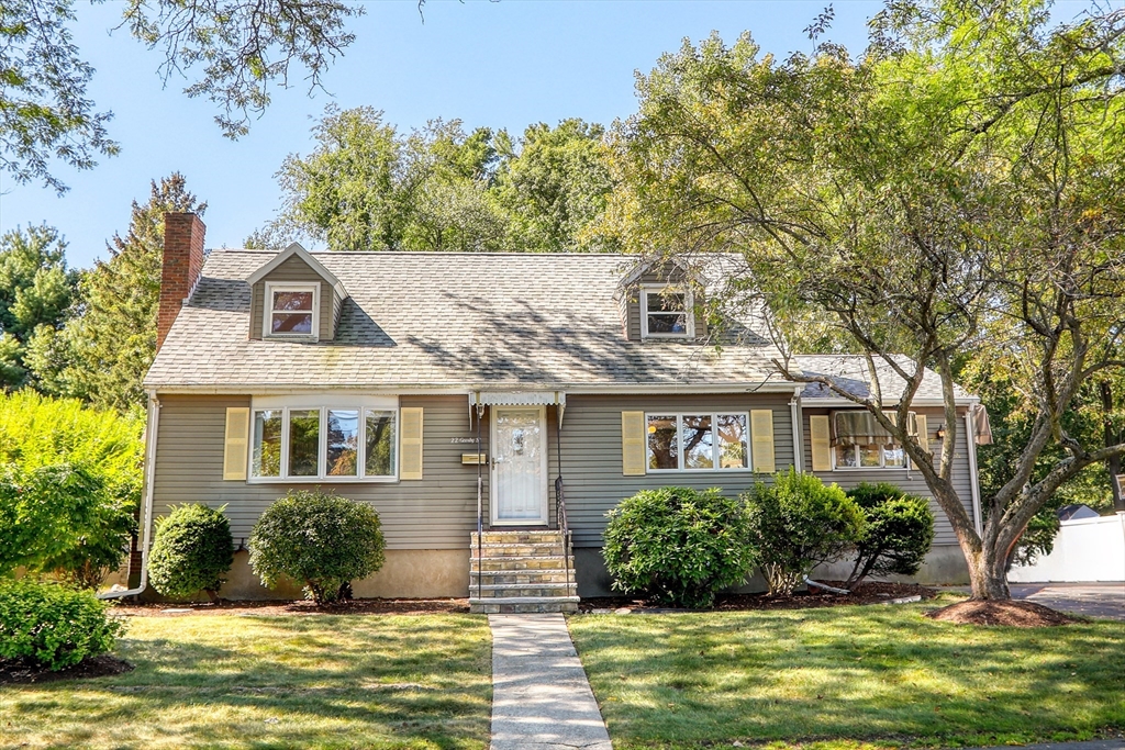 front view of a house with a yard